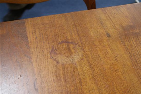 A Danish teak extending dining table designed by Peter Hvidt & Orla Mølgaard Nielsen for France and Daverkosen and ten Dutch manufactur